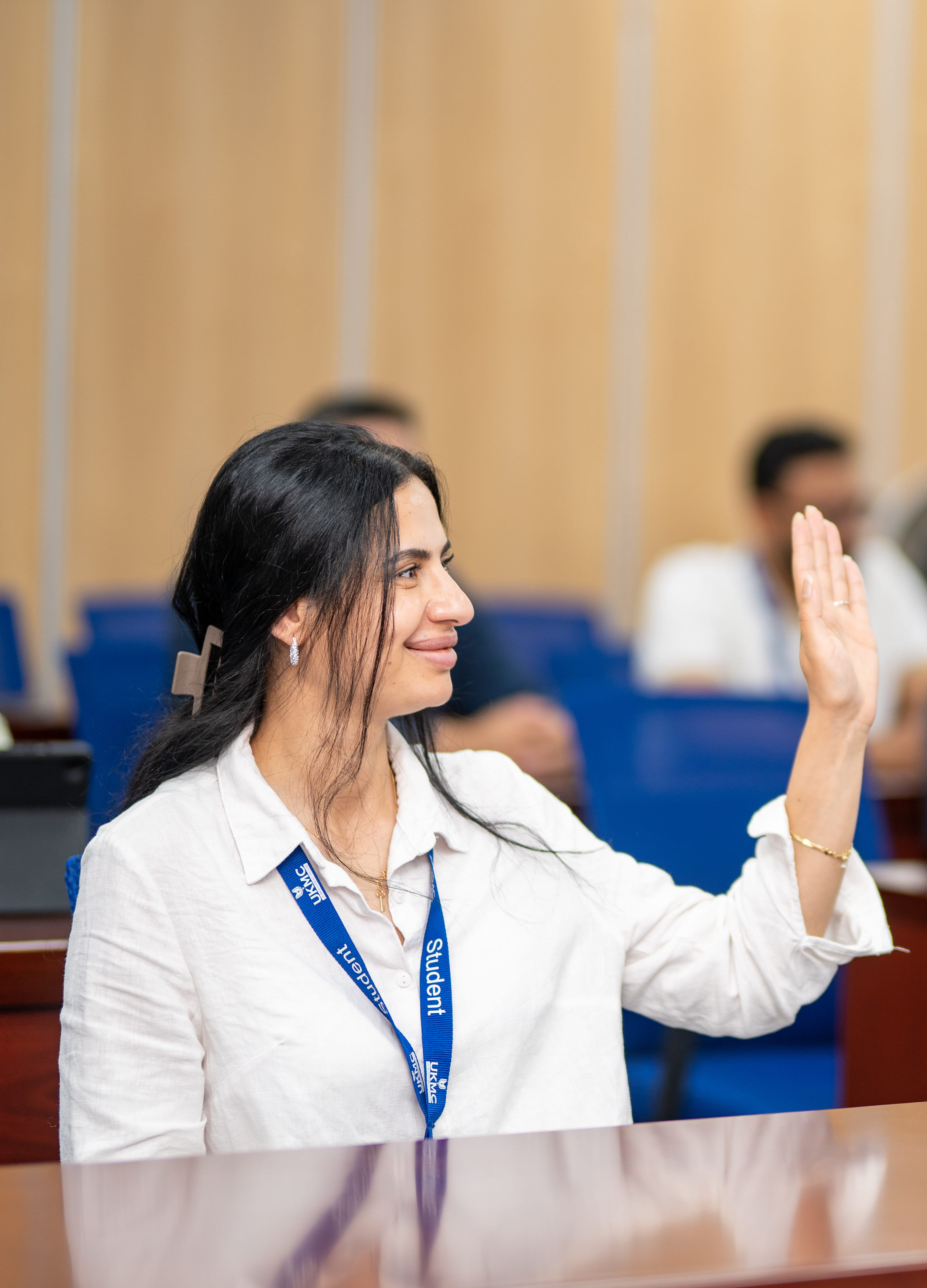 A student representative speaking at a UKMC Student Association meeting